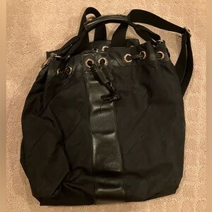 Kate Spade Small Black Backpack with Drawstring and Gold Accents